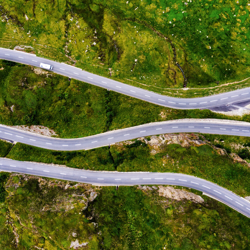Aerial view of winding roadway in mountains